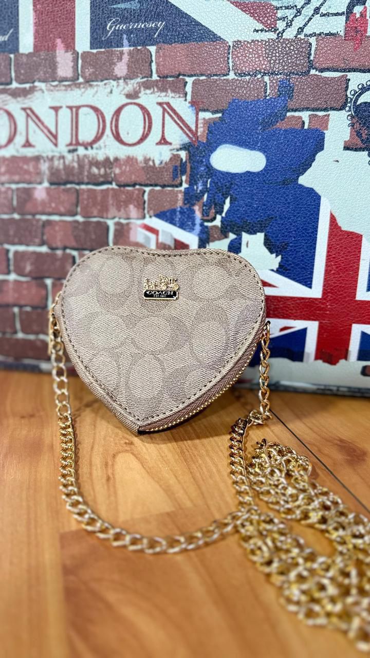 BOLSITAS CON CADENA, TELA DE IMPORTACIÓN