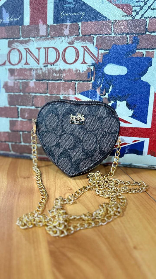 BOLSITAS CON CADENA, TELA DE IMPORTACIÓN