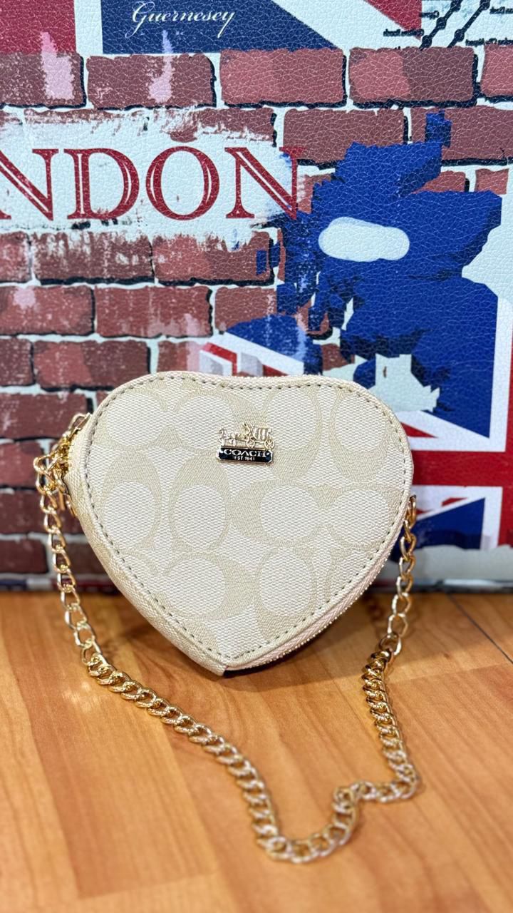 BOLSITAS CON CADENA, TELA DE IMPORTACIÓN